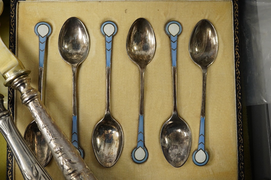 A boxed set of enamelled spoons, mother of pearl handled cutlery and similar serving spoons etc., serving spoon set 26cm long. Condition - fair to good